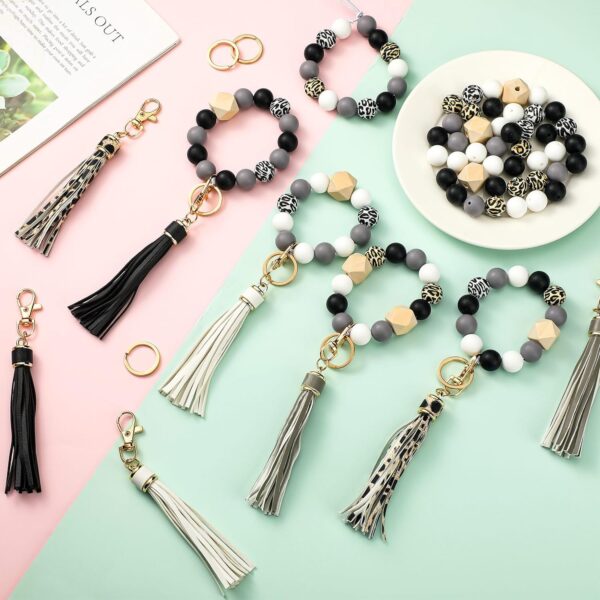 Sratte 125 Pcs Silicone Beads for Keychain Making Kit 100 Pcs 15mm Multiple Silicone Beads Bulk with 8 Key Rings 8 Octagonal Wood Beads 8 Tassels 1 Rope for Bracelet Jewelry Necklace DIY Supplies 3
