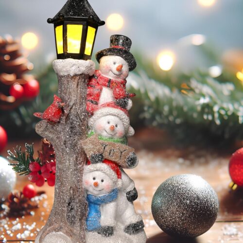 91XykrF7BLL._AC_SL1500_ Handcrafted Resin Christmas Trio Snowman with LED Lamppost - 11.2'' Festive Snowman