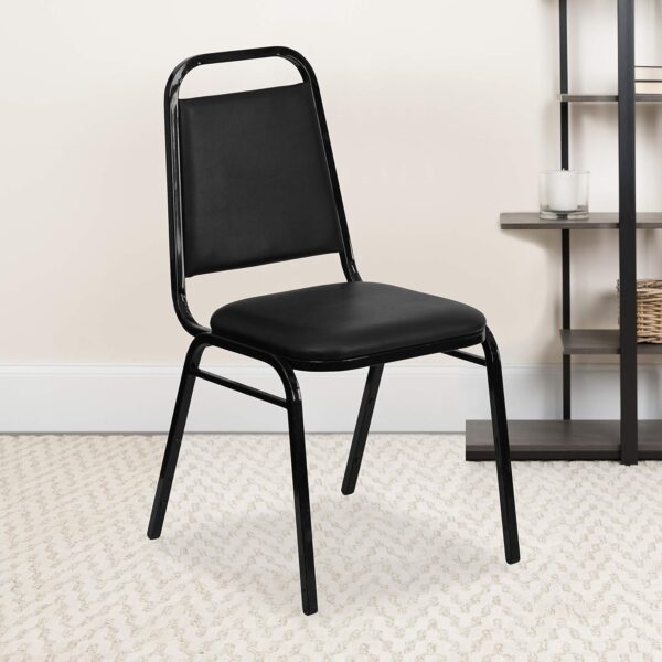 Trapezoidal Back Vinyl Stackable Banquet Chair, Multipurpose Stacking Chair with Padded Seat and Back, Black 1